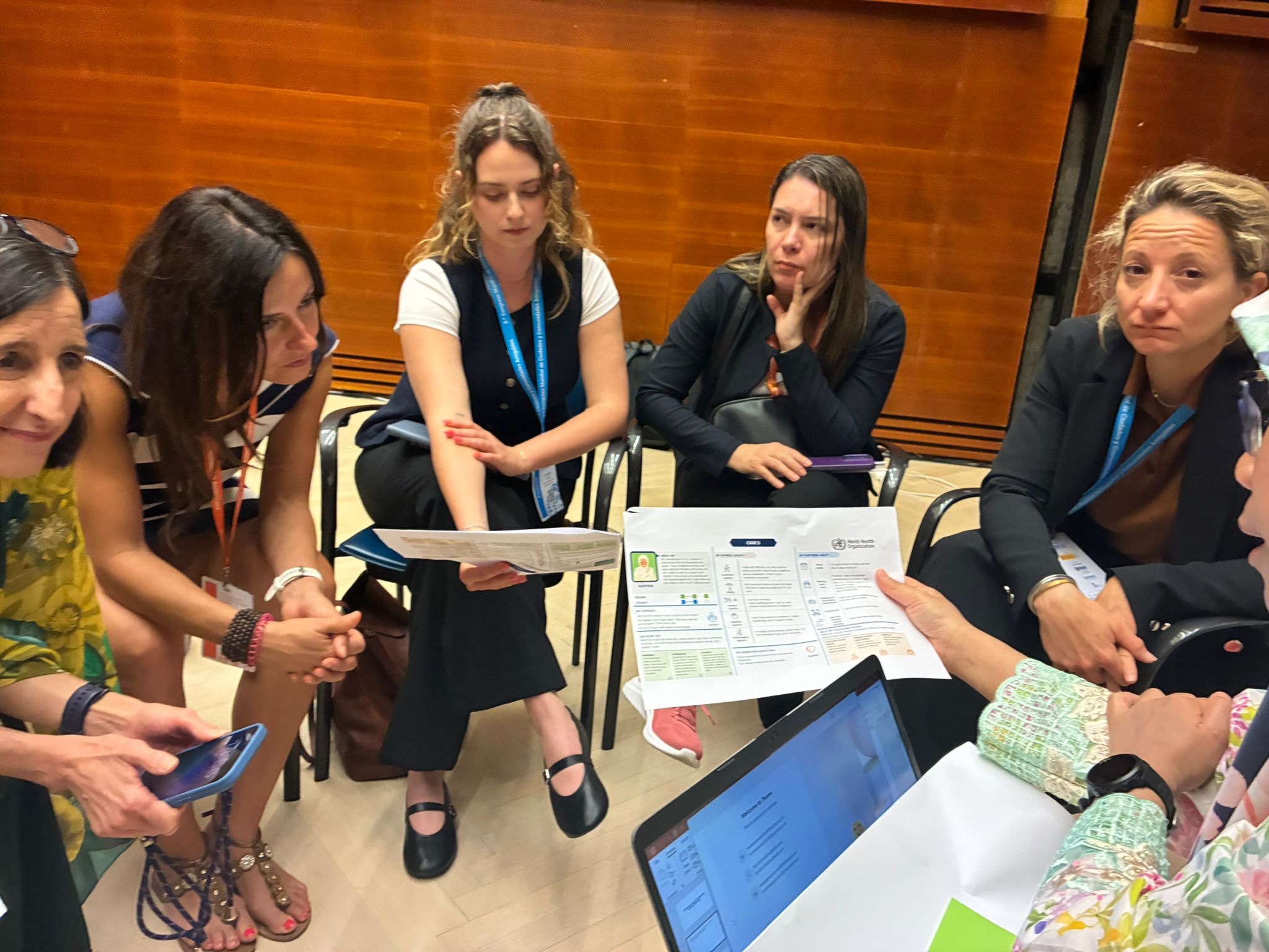 Participants taking part in small-group work during the ICOPE workshop